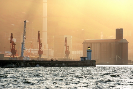 Getxo dock with lighthouse with sunset lightの写真素材