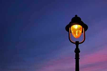lamppost illuminated at twilightの写真素材