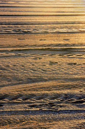 background of lines on beach sandの写真素材