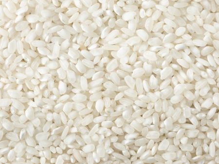 background with closeup of rice grainsの写真素材