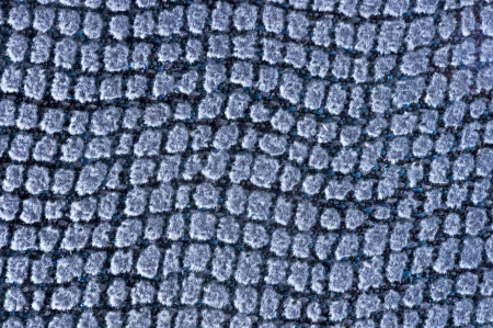 closeup of soft cushion surface with square texturesの写真素材