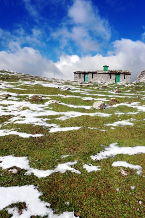 cabin in mountain with some snowの写真素材