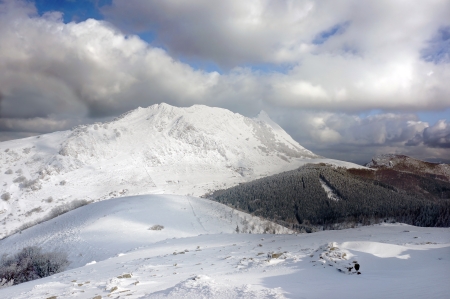 winter landscape with snowy mountains in Basque Countryの写真素材