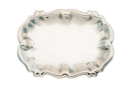 empty silver tray isolated on white backgroundの写真素材