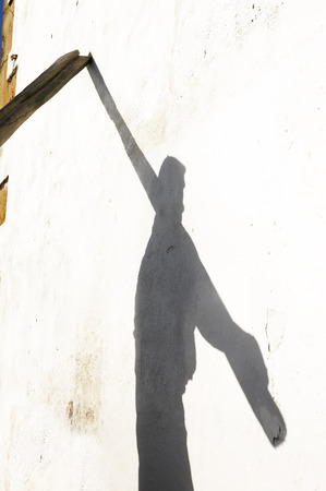 shadow of fisherman with big oarsの写真素材
