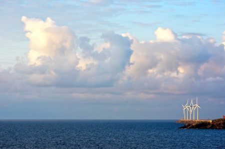 wind turbines on the sea with beautiful cloudsの写真素材