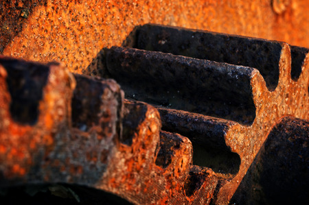 rusty and metallic gear wheel の写真素材