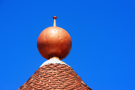 house roof and dome against blue skyの写真素材