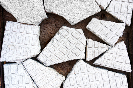 background of a broken sidewalkの写真素材
