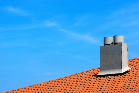 chimney on a house roofの写真素材