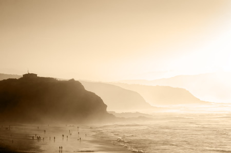 people in the Sopelana beach with hazeの写真素材