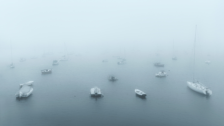boats in port at foggy morningの写真素材