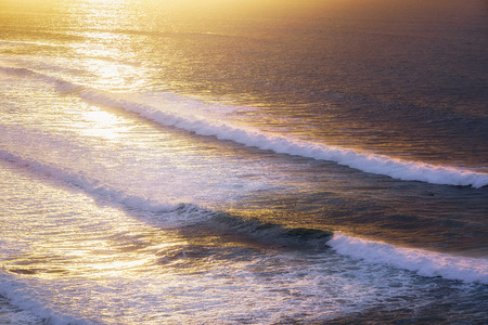 beautiful seascape with waves at the sunset
