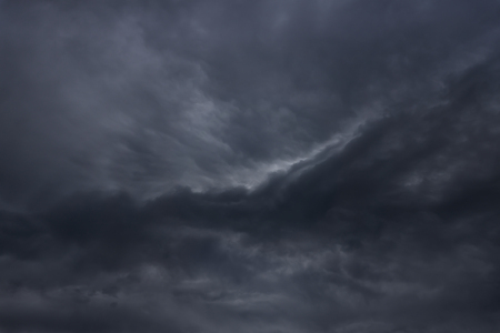 cloudscape background with dark stormy cloudsの写真素材