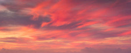 background of sunset cloudscape with red cloudsの写真素材