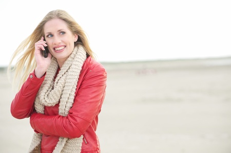 Beautiful Blond Calling on Phoneの写真素材
