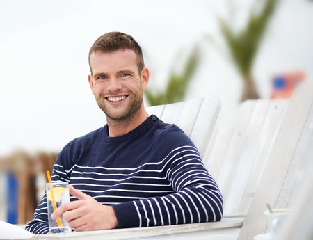 Portrait of a handsome young man enjoying life outdoors