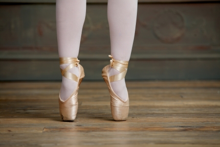 Close up ballerina standing on tiptoeの写真素材