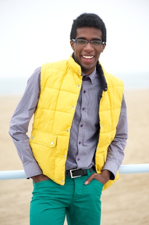 Portrait of a happy african american male fashion model in colorful clothingの写真素材
