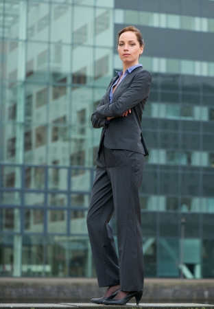 Portrait of a confident businesswoman standing outside the officeの写真素材