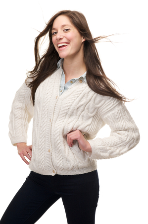 Portrait of a pretty woman smiling on isolated white backgroundの写真素材