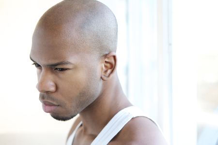 Close up horizontal portrait of a handsome young manの写真素材