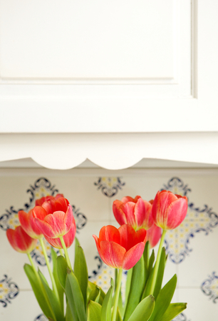 Beautiful bouquet of red tulips indoors. Copy space の写真素材