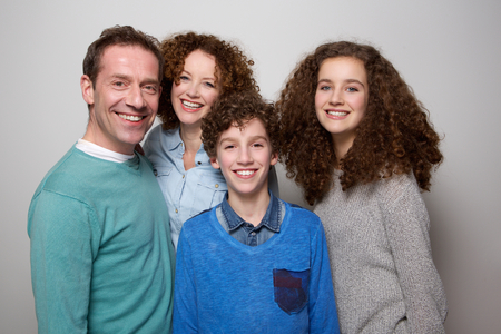 Portrait of a happy family smiling together