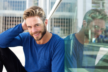 Close up portrait of a handsome smiling man with beardの写真素材