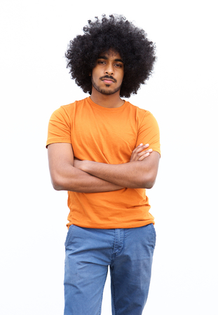 Portrait of a cool black guy with afro standing isolated white backgroundの写真素材