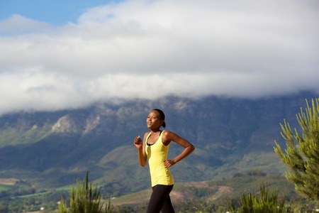 Portrait of fitness woman exercising outdoors in natureの写真素材