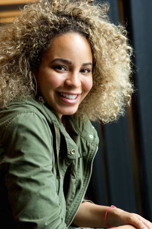 Portrait of happy confident young african american woman smilingの写真素材