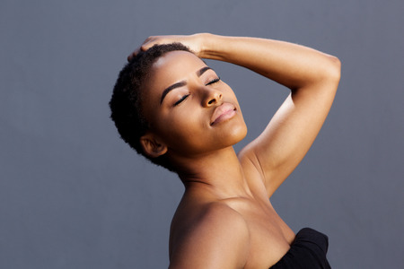 Portrait of female fashion model with hand in hair