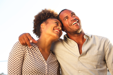Portrait of happy man and woman standing together on dateの写真素材