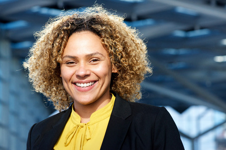 Close up portrait of happy businesswoman smilingの写真素材