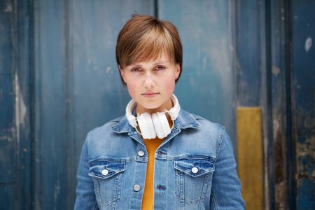 Portrait of cool young woman looking at cameraの写真素材