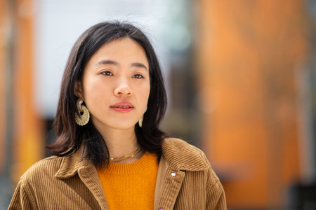 Portrait young asian woman with serious expressionの写真素材