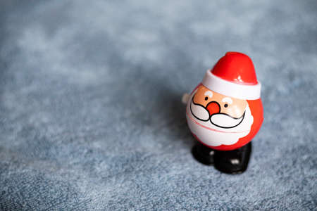 A toy, spring-loaded and jumping Santa Claus.の写真素材
