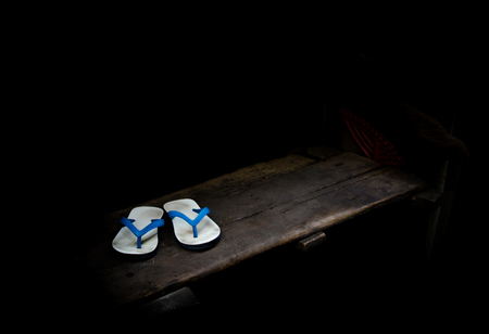 Old sandals over stairsの写真素材