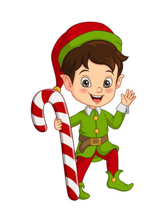 Cute little boy in christmas elf costume holding a candy caneのイラスト素材