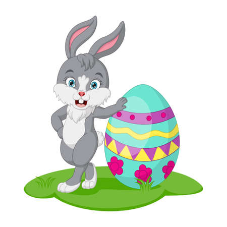 Cute little bunny with easter egg in the grassのイラスト素材