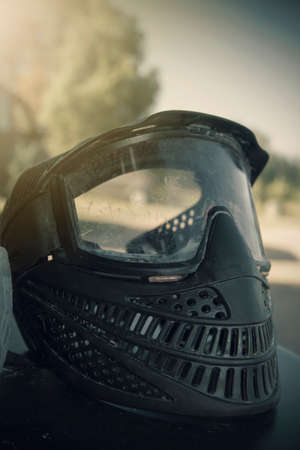 Gotcha players with protective mask, gun and wild attitude. Paint Bullet Playersの写真素材