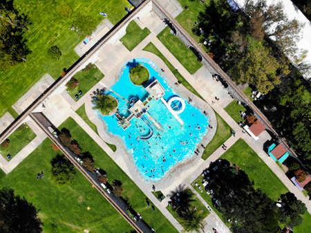 aerial shot of children having fun on slidesのeditorial素材