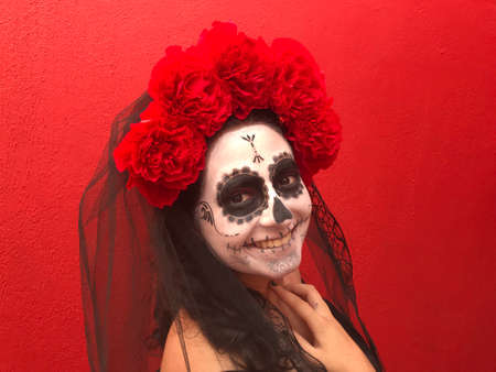 Mexican girl disguised as a Catrina on the Day of the Dead festivalの写真素材