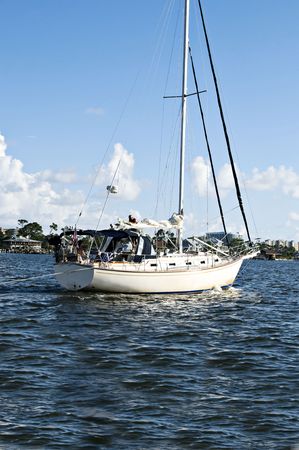 Sail boat touring the Gulf of Mexico on a beautiful summer day.の写真素材