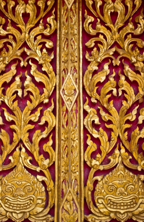 the door trim buddha in thailandの写真素材