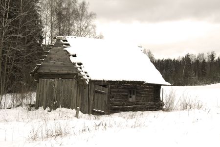 Old house is standing in wintet coverd with snowの写真素材