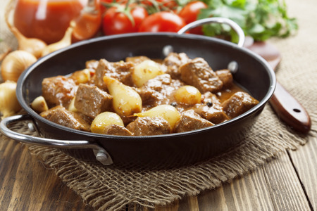 Stifado. Stewed beef with onions and tomatoesの写真素材
