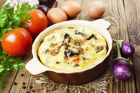 Omelet with vegetables in a frying panの写真素材