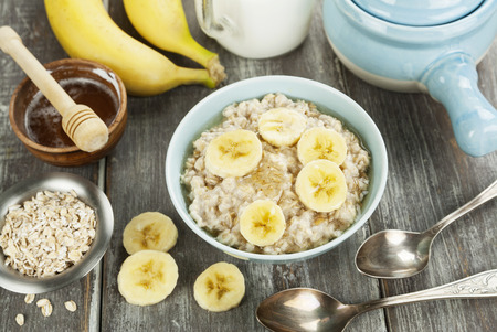 Porridge with bananas and honey. Healthy breakfastの写真素材